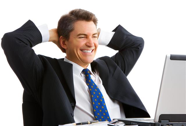 happy-man-looking-at-computer Happy Man at Computer